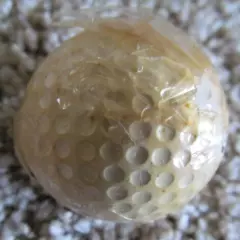 VINTAGE SPALDING TOP-FLITE DOUBLE DOT GOLF BALL WITH PARTIAL CELLOPHANE WRAPPER