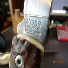 VOSS CUTLERY CO. MADE A 5" DIRT BUSTER WITH DEER STAG HANDLE GERMAN LOCKING BLA