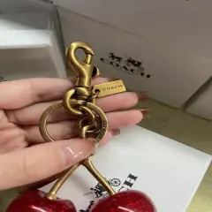 Coach Cherry Bag Charm KeyChain Glitter resin and metal Brass/Red Apple