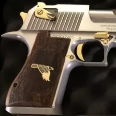 Desert Eagle grips made from Walnut wood with Custom logo made of Brass.