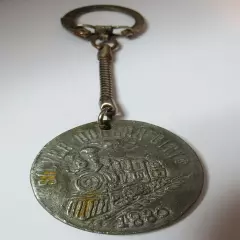 VINTAGE 1880 SILVER DOLLAR CITY EAGLE TRAIN KEY CHAIN SILVER TONE OLD MEDAL