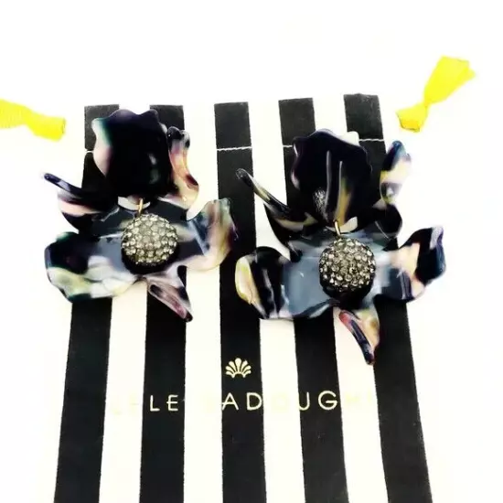 Lele Sadoughi twilight Lily Flower Clip On Large earrings.