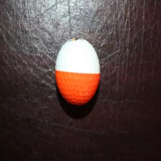 VINTAGE ORANGE AND WHITE PING EYE 2 GOLF BALL ROUGH RIDER COUNTRY N DAKOTA LOGO