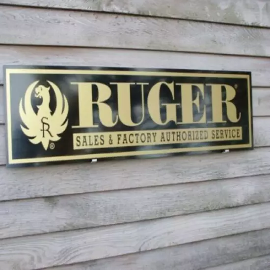 EARLY STYLE STURM RUGER FIREARMS DEALER SIGN/AD 1'X46" ALUM. PANEL W/EAGLE LOGO