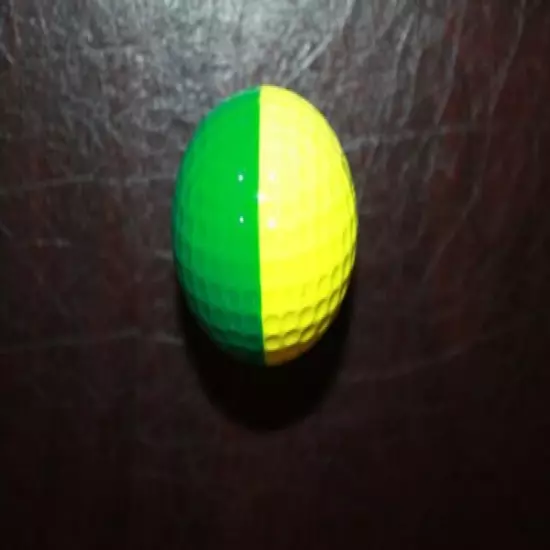 VINTAGE GREEN AND YELLOW PING PROMOTIONAL GOLF BALL 