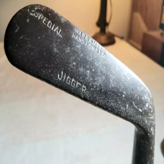 ANTIQUE WARRANTED HAND FORGED STEEL SPECIAL JIGGER GOLF CLUB WITH WOODEN SHAFT