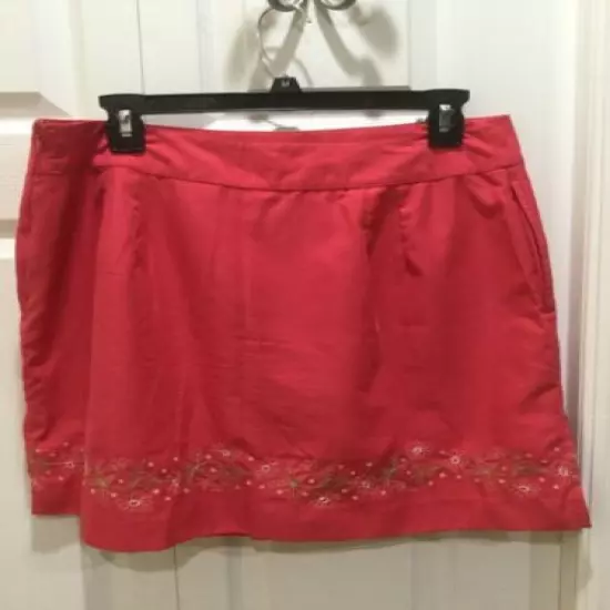 Women’s IZOD Golf Skort. Pink with Embroidered bottom. Size 8.