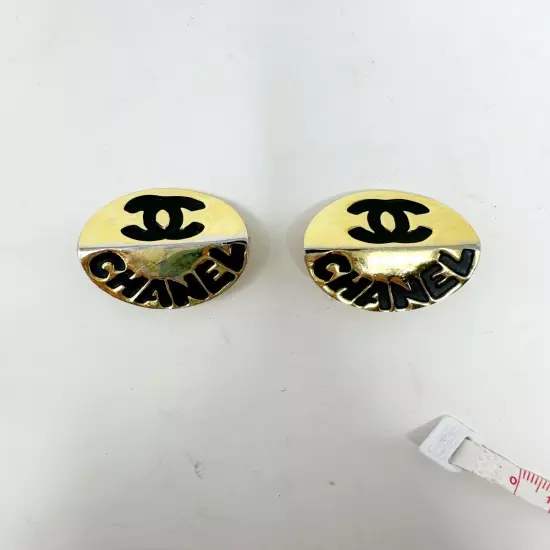 Chanel Pair of Gold Plated Black Metal Clip On Earrings Interlocked C Logo Round