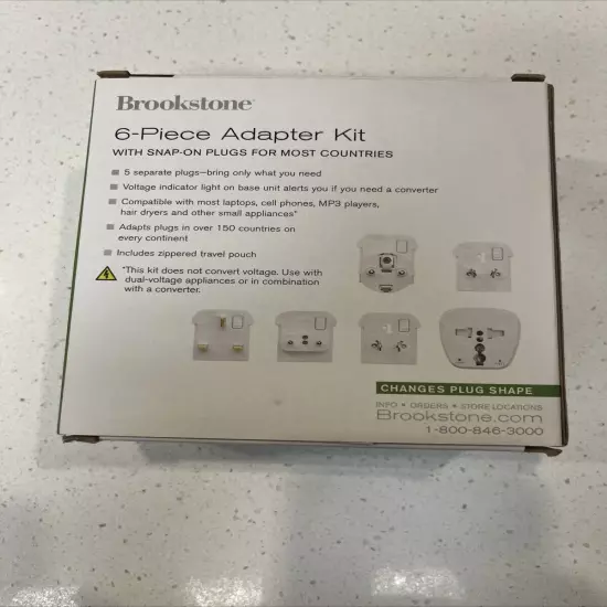 Brookstone 6-Piece Adapter Kit Travel Accessories Snap On Plugs Most Countries