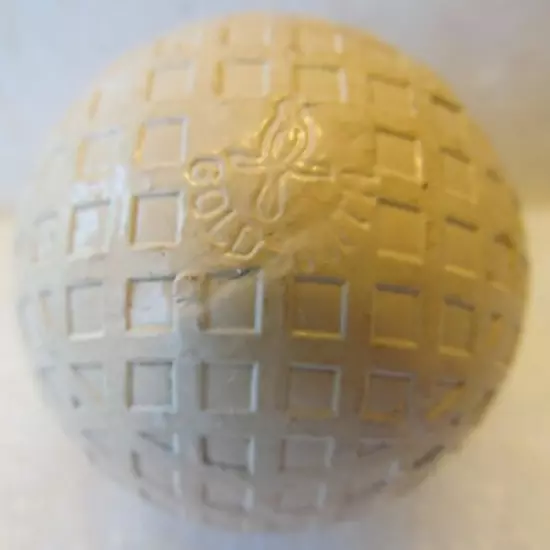 VINTAGE MESH GOLF BALL-THE GOLDSMITH ORIOLE-FEW STRIKE MARKS-ORIOLE ON EACH POLE