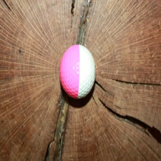 VINTAGE PINK AND WHITE PING EYE PROMOTIONAL GOLF BALL 