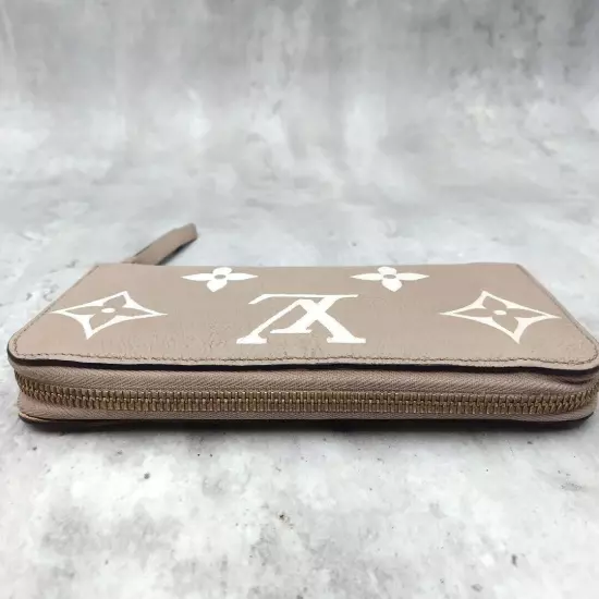 LOUIS VUITTON M69794 Bi Color Empreinte True Tail Zippy Long Wallet