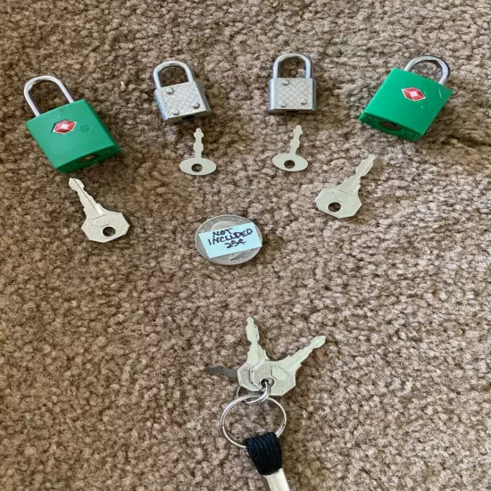 4 locks, 2 are TSA Approved Travel Locks and 2 smaller locks. 7 keys+lanyard