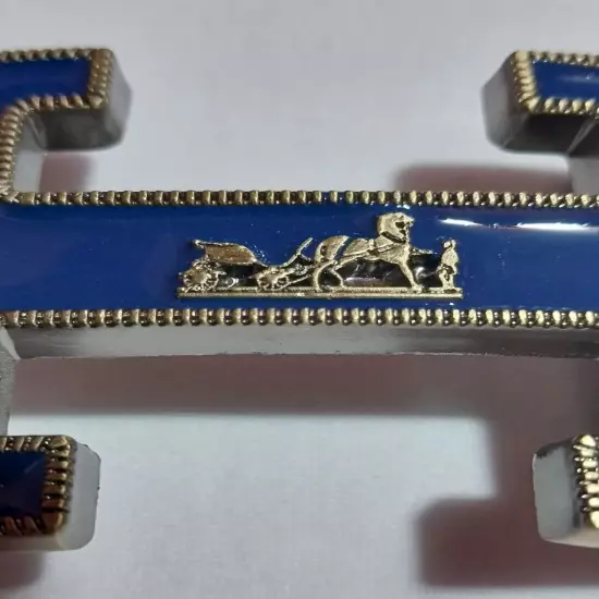 HERMES. Belt buckle with "HERMES" inscription. Gold-blue tone. 