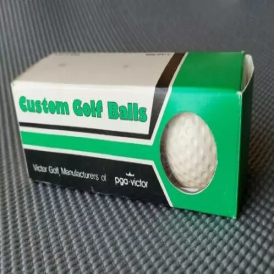 PGA-VICTOR MR AND MRS "T" CUSTOM GULF BALL SLEEVE. GREEN,WHITE,BLACK LOGO BOX. 