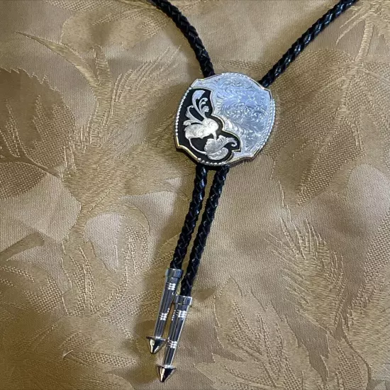 Montana Silversmith Western Bolo Tie Engraved Silver Oval w/ Leather Rope