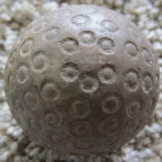 RARE CRIMEA GOLF BALL WITH UNUSUAL COVER PATTERN-A COUPLE OF STRIKE MARKS