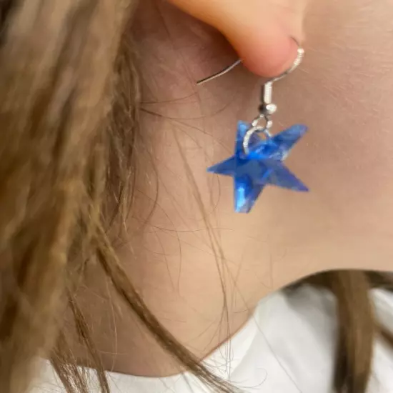 light blue star dangle earrings