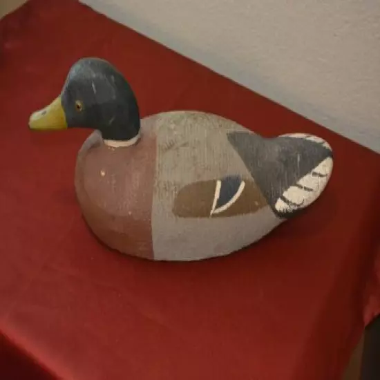 Hand carved turned wood duck with glass eyes