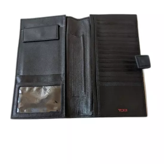 Tumi black leather travel wallet, passport cover and card organizer 9 x 5 inches