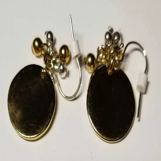 Silvertone and Goldtone Earrings with Dangling Balls. 