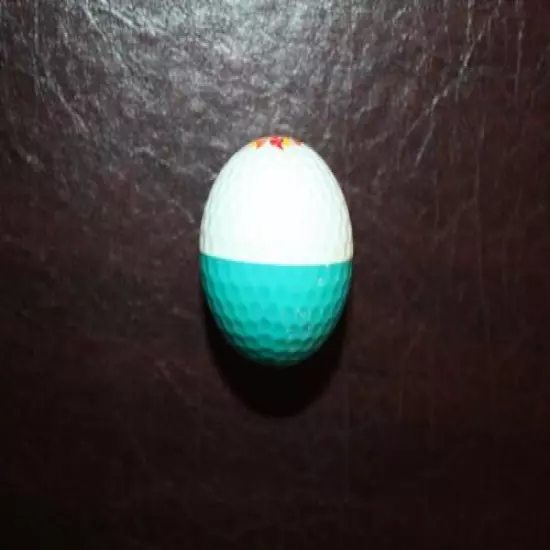 VINTAGE TEAL AND WHITE PING EYE 2 GOLF BALL WITH SUNFLOWER LOGO