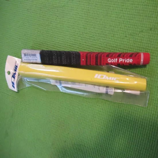 New putter grip lot. You get both. Yellow iomic + red black