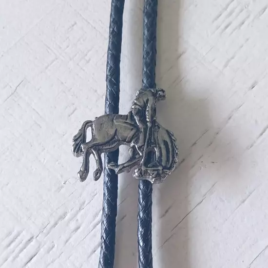 Vtg Country Western Cowboy Bucking Bronco Bolo Tie Horse Black Cord Metal Tips