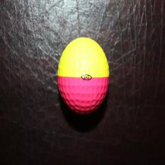 VINTAGE PINK AND YELLOW PING EYE GOLF BALL 