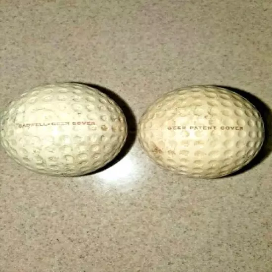 TWO VINTAGE SILVER KING GOLF BALLS WITH GEER PATENT & CALDWELL COVERS