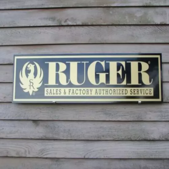 EARLY STYLE STURM RUGER FIREARMS DEALER SIGN/AD 1'X46" ALUM. PANEL W/EAGLE LOGO