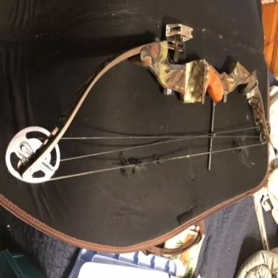 Used left handed compound bow. Wrist guard and sites included. 