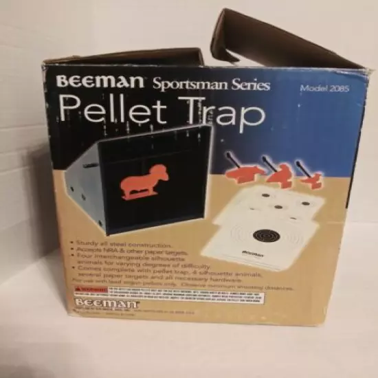 Marksman Pellet Trap with silhouettes and targets. Old box with water damage