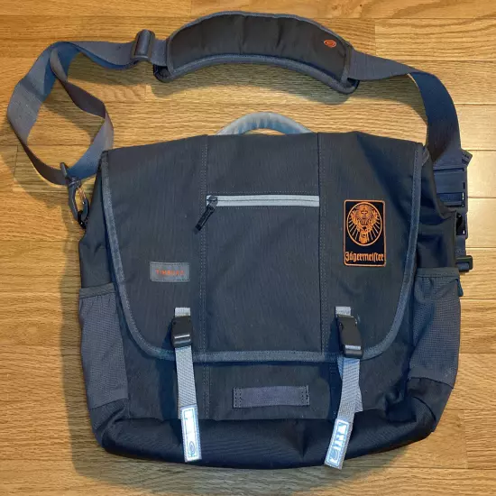 PRE OWNED TIMBUK2 MESSENGER BAG - GRAY W/ ORANGE ACCENTE AND JAGERMEISTER PATCH