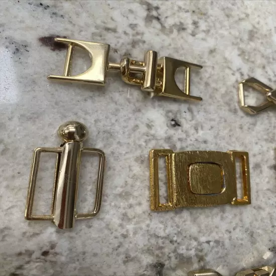 Assorted Gold Tone Interlocking Womens Belt Buckles Two-piece Lot of 9