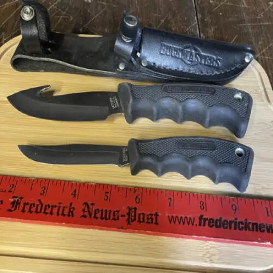 pair of buckmaster knives w sheath