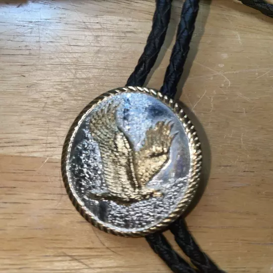 VTG Signed Ivan American Eagle Silver & gold bolo Tie black braided cord Brass