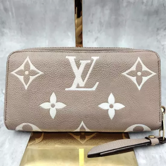 LOUIS VUITTON M69794 Bi Color Empreinte True Tail Zippy Long Wallet