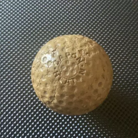 “CAPON HEATON” VINTAGE GOLF BALL , CIRCA 1921