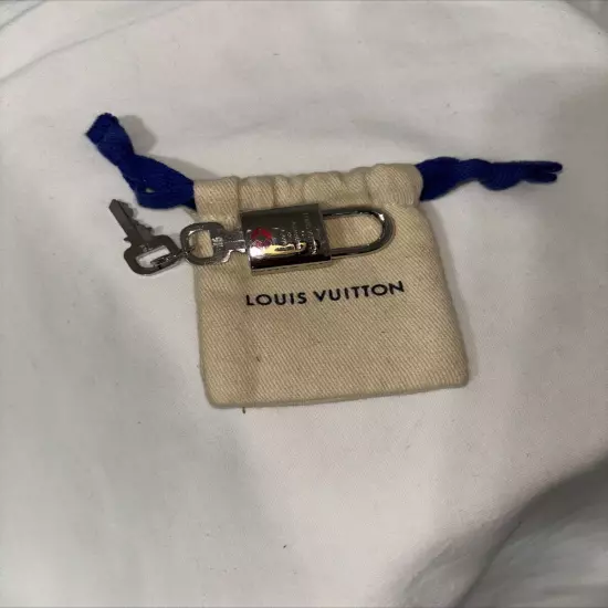 NEW Silver toned Louis Vuitton Lock 