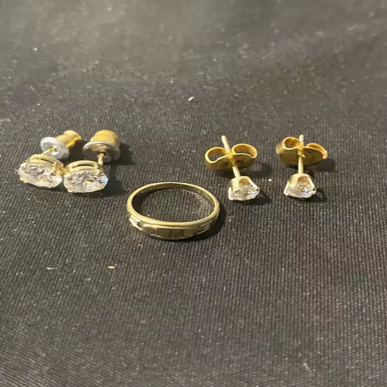 stud earringsset and Baby Ring initials “LM”. All Test 14kt Gold. Stones Unknown