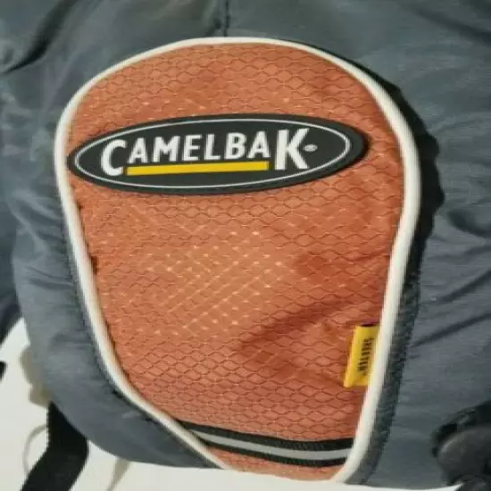 orange and gray Camelbak hydration pak with bladder