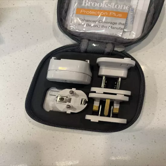 Brookstone 6-Piece Adapter Kit Travel Accessories Snap On Plugs Most Countries