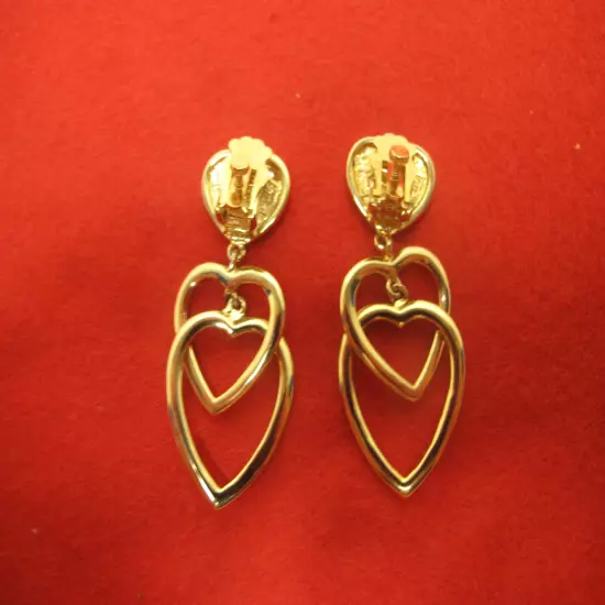 Signed Nolan Miller Gold Tone Rhinestone Triple Heart Drop Dangle Clip Earrings