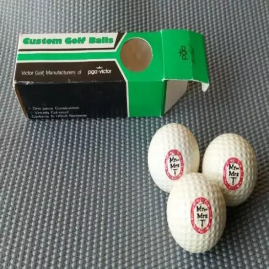 PGA-VICTOR MR AND MRS "T" CUSTOM GULF BALL SLEEVE. GREEN,WHITE,BLACK LOGO BOX. 