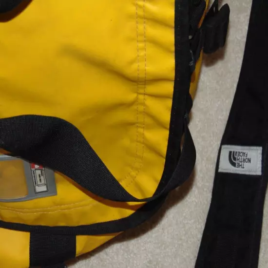 THE NORTH FACE YELLOW/BLACK DUFFEL BAG WITH BACKPACK STRAPS