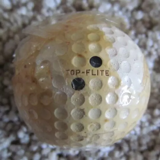 VINTAGE SPALDING TOP-FLITE DOUBLE DOT GOLF BALL WITH PARTIAL CELLOPHANE WRAPPER