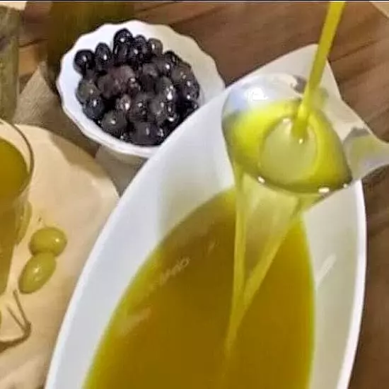 A Bottle Of Cold-Pressed Extra Virgin Olive Oil With a Capacity Of One And a Hal