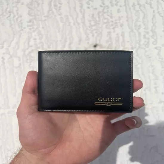 Gucci Black Leather Bi-Fold Wallet with Gold Gucci Logo (8 Slots) New Authentic