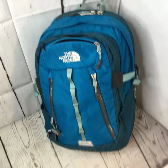 The North Face Surge II Blue Backpack Multi Compartment Bottle Holder Travel 